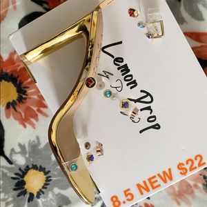 clear heel with multi color gems.